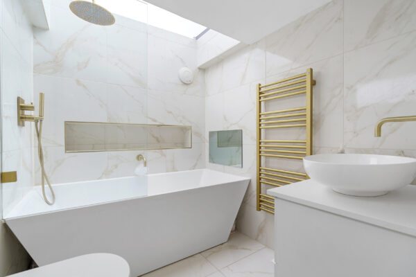 High-end bathroom with tiled finish and natural light